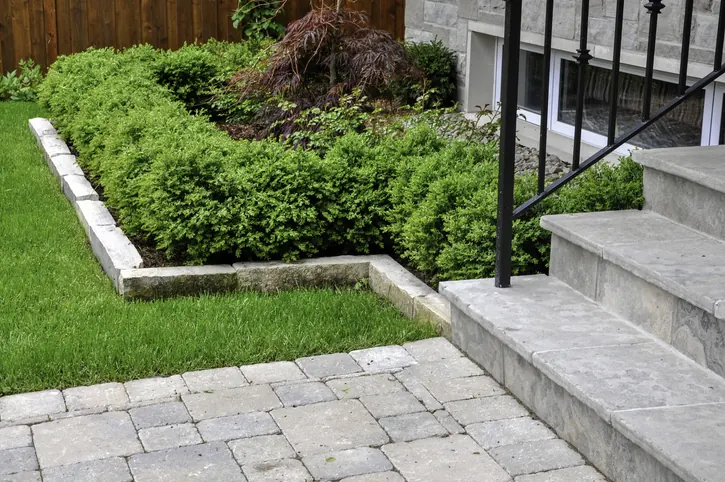 Bluestone masonry work installed by Greatness Landscaping & Construction